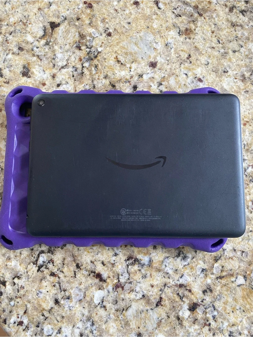 Amazon Fire HD 8 (10th Generation) tablet with purple protective kids case